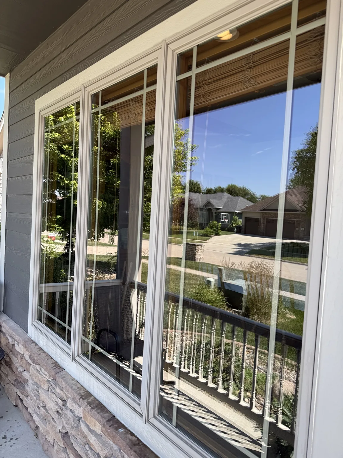 Clean front windows on an Ankeny home